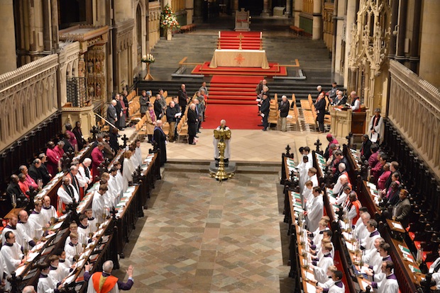 The primates of the Anglican Communion pray during Evensong in Canterbury Cathedral on January 11, the first day of their five-day meeting