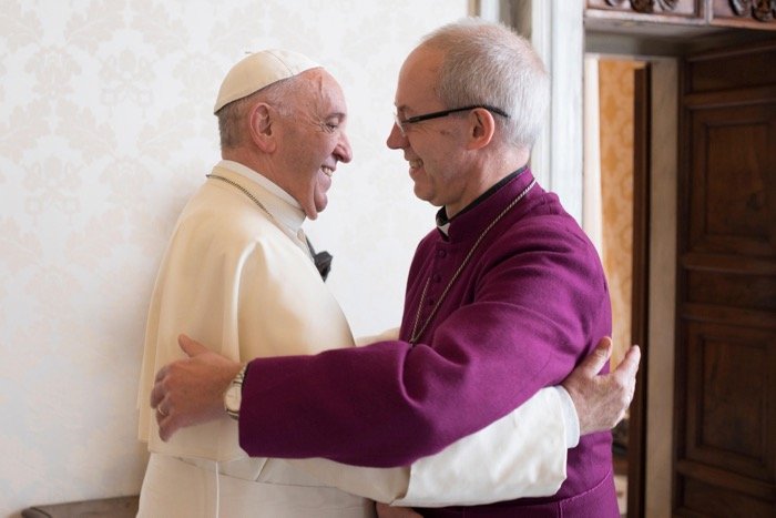 Pope Francis greets Archbishop of Canterbury Justin Welby during a private audience at the Vatican