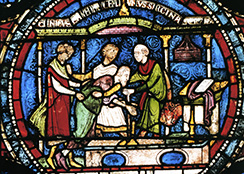 Stained glass window depicting ordination