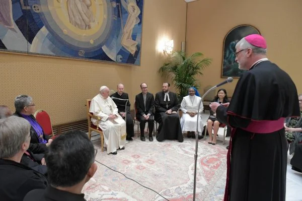Bishop Shane Mackinlay, co-chair of the Methodist-Roman Catholic International Commission, reports on the commission's work to Pope Francis