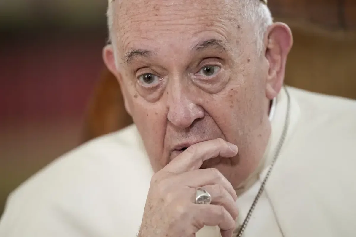 Pope Francis speaks during an interview with The Associated Press at the Vatican. Francis acknowledged that Catholic bishops in some parts of the world support laws that criminalize homosexuality or discriminate against the LGBTQ community, and he himself referred to homosexuality in terms of 'sin.' But he attributed attitudes to cultural backgrounds, and said bishops in particular need to undergo a process of change to recognize the dignity of everyone