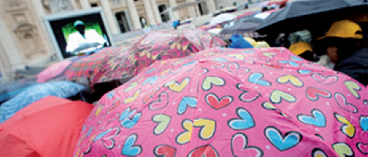 The papal general audience with a sea of umbrellas