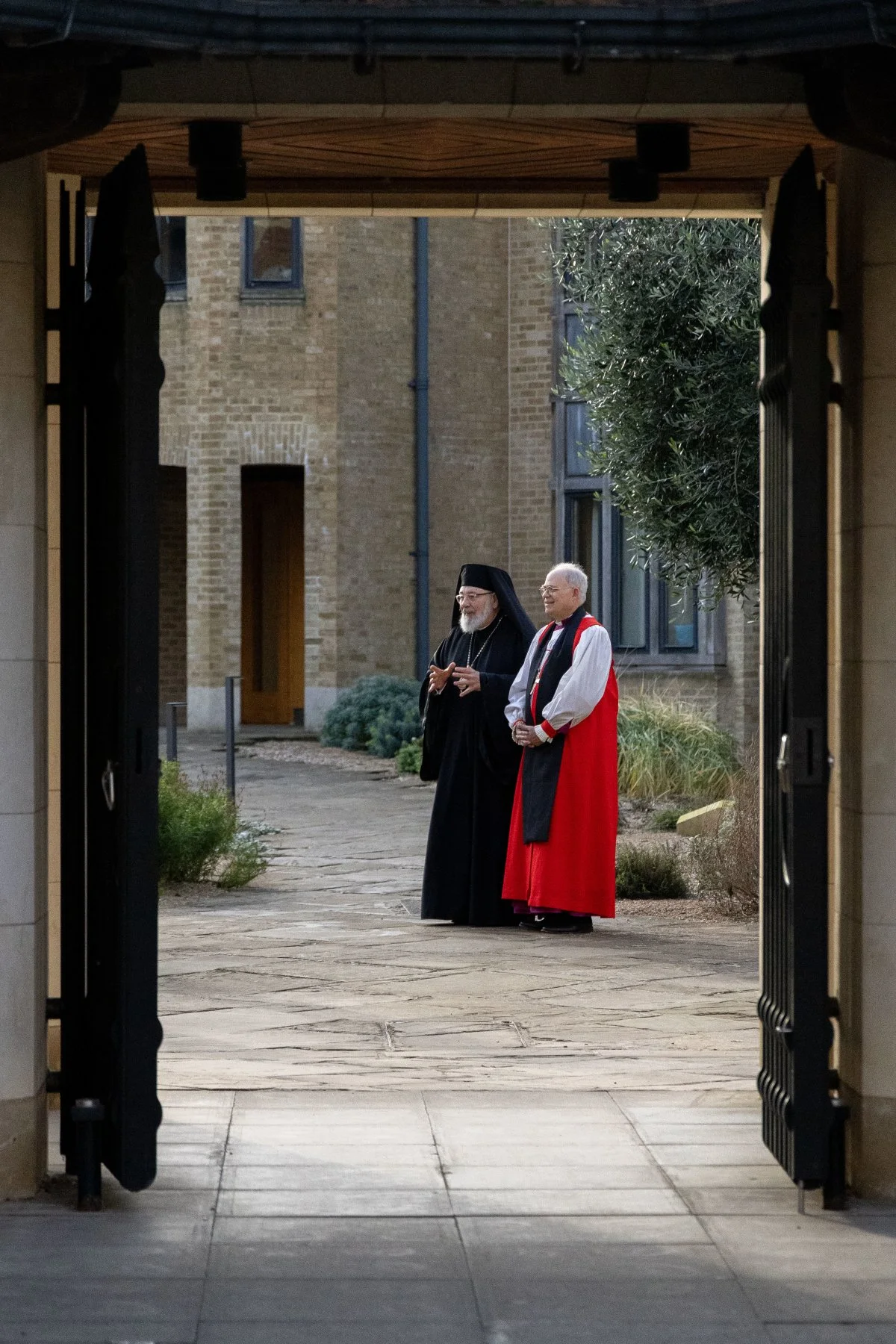 Episcopalian Bishop John Bauerschmidt of Tennessee and Romanian Catholic Bishop John M. Botean of the Eparchy of St George in Canton, Ohio, pose for a photo at Canterbury Cathedral in England during the final part of a pilgrimage to Rome and Canterbury sponsored by the International Anglican-Roman Catholic Commission for Unity and Mission