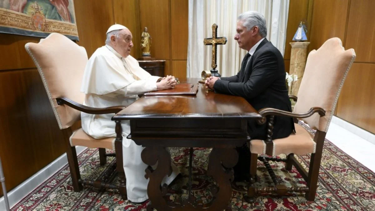 Pope Francis speaks with Cuban President Miguel Díaz-Canel during a private meeting in the papal studio of the Vatican audience hall