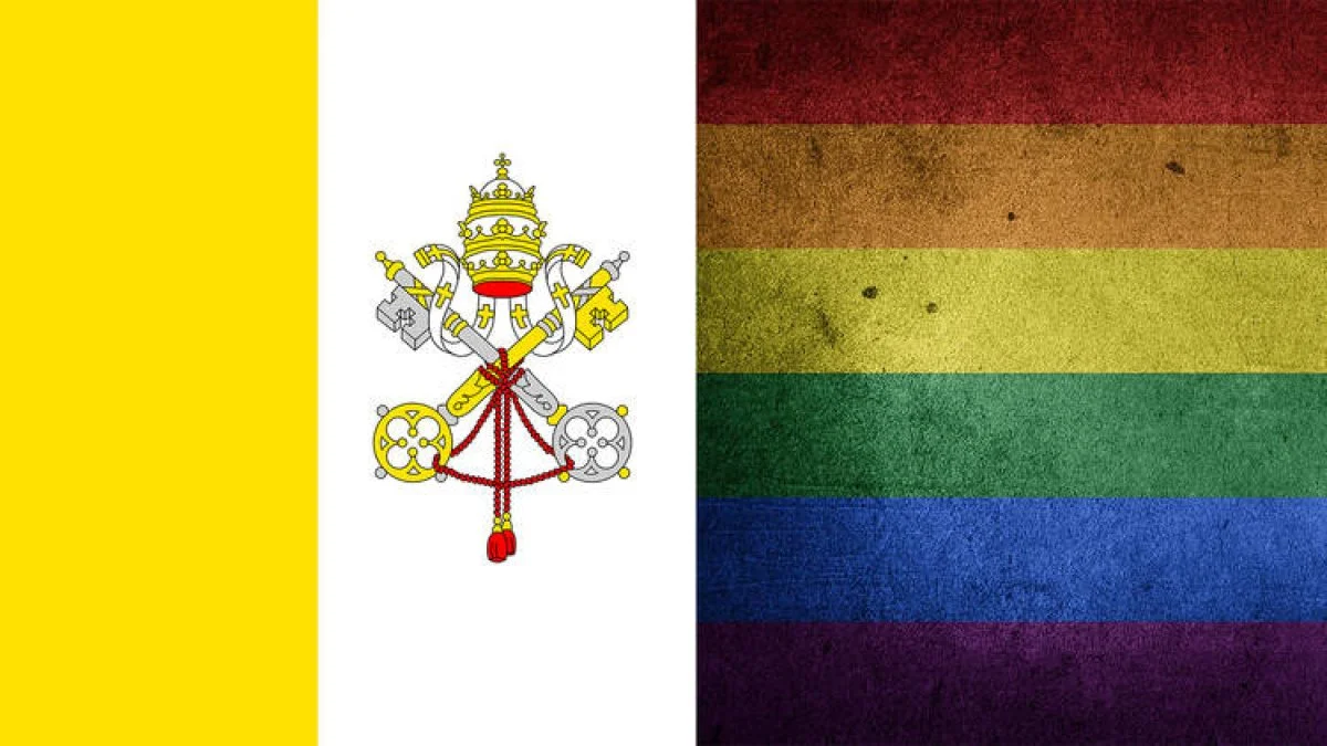 The Vatican City flag, left, and a pride flag