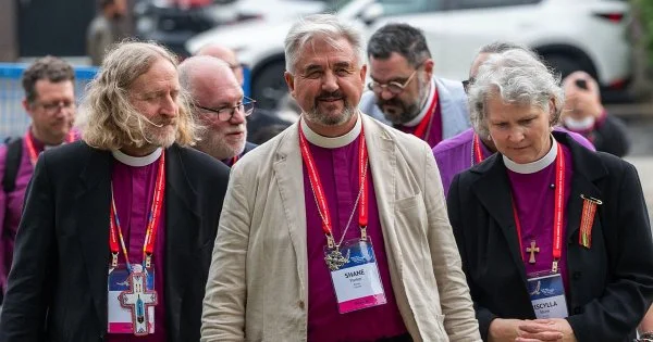 Following his surprise election, the Anglican Church of Canada's Primate-elect Shane Parker walks to St. Paul's Cathedral accompanied by other members of the House of Bishops to greet General Synod