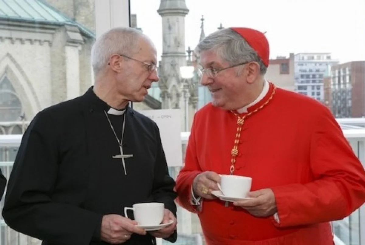 The Archbishop of Canterbury, Justin Welby, and the Roman Catholic Archbishop of Toronto, Cardinal Thomas Collins, at an ecumenical reception in St. James Cathedral Centre. Welby visited the Anglican Church of Canada, April 7 to 8