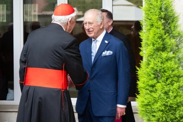 Cardinal Vincent Nichols, Archbishop of Westminster, greeting King Charles III