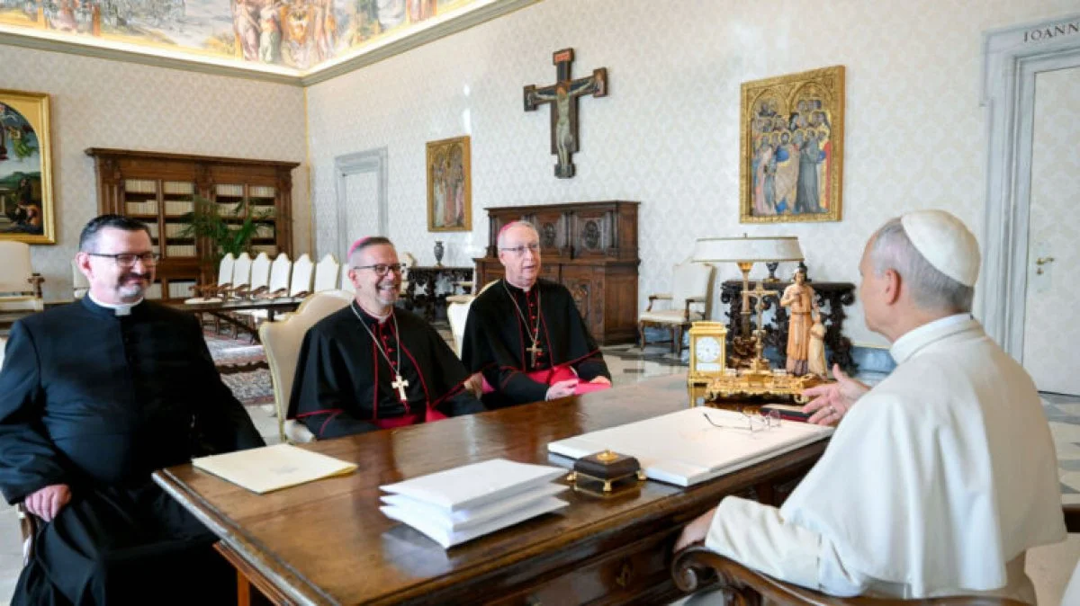 Pope Leo XIV meets with leaders of the Canadian Conference of Catholic Bishops and gives the conference 62 artifacts that will be returned to Indigenous communities in Canada. With the pope, from the left, are: Father Jean Vézina, general secretary of the CCCB; Bishop Pierre Goudreault of Sainte-Anne-de-la-Pocatière, Québec, CCCB president; and Archbishop Richard Smith of Vancouver, a member of the Canadian Catholic Indigenous Council