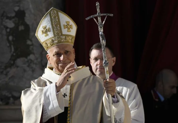 Pope Leo XIV gives his blessing to people attending Mass for the Jubilee of Choirs and the feast of Christ the King in St. Peter's Square at the Vatican. At the end of Mass, the pope announced the release of his apostolic letter, 'In Unitate Fidei' ('In the Unity of Faith') on the Creed and the 1,700th anniversary of the Council of Nicaea