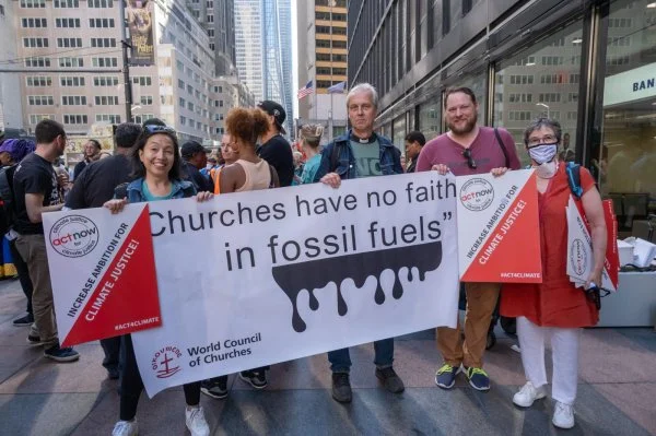 People of faith joined together in an interfaith invocation before the March to End Fossil Fuel in New York City