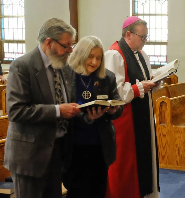 Rev. Brian Maitland, Mary Nordick, and Bishop Chad McCharles singing during the closing service of the Week of Prayer for Christian Unity, held at St. Andrew's Presbyterian Church in Saskatoon