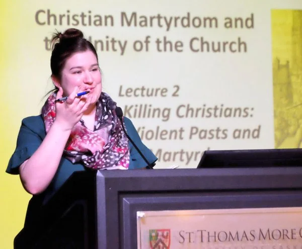 Celeste Woloschuk of the St. Thomas More College Campus Ministry team opened the De Margerie Lecture in Saskatoon with words of welcome