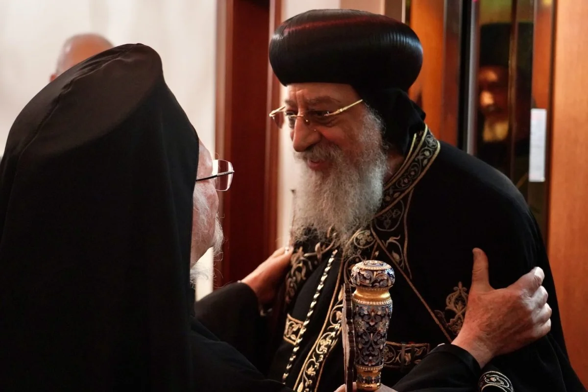 Ecumenical Patriarch Bartholomew (right) greets Coptic Pope Tawadros II at the Phanar
