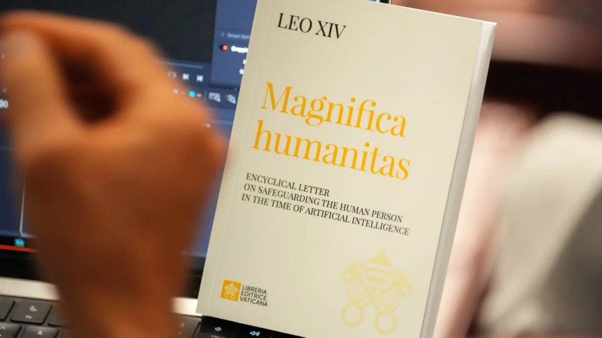 A copy of Pope Leo XIV’s first encyclical, 'Magnifica Humanitas: On Safeguarding the Human Person in the Time of Artificial Intelligence,' is seen during a presentation on the document at the Vatican