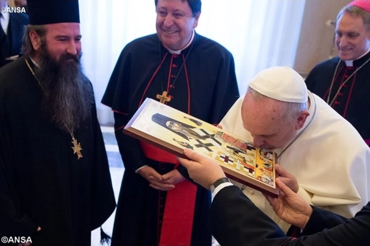 Pope Francis kisses an icon during an Ecumenical Meeting of Religious and Nuns sponsored by the Congregation for Institutes of Consecrated Life and Societies of Apostolic Life