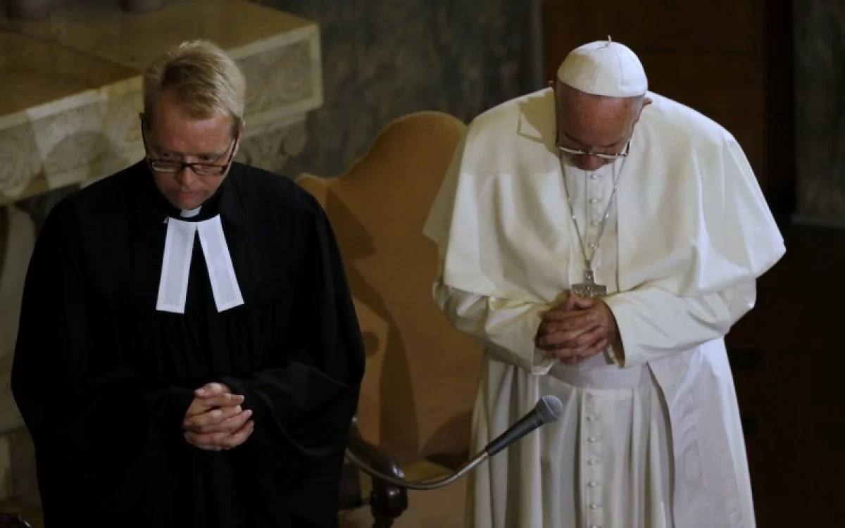 Pastor Jens-Martin Kruse, pastor of Christuskirche in Rome and Pope Francis at vespers
