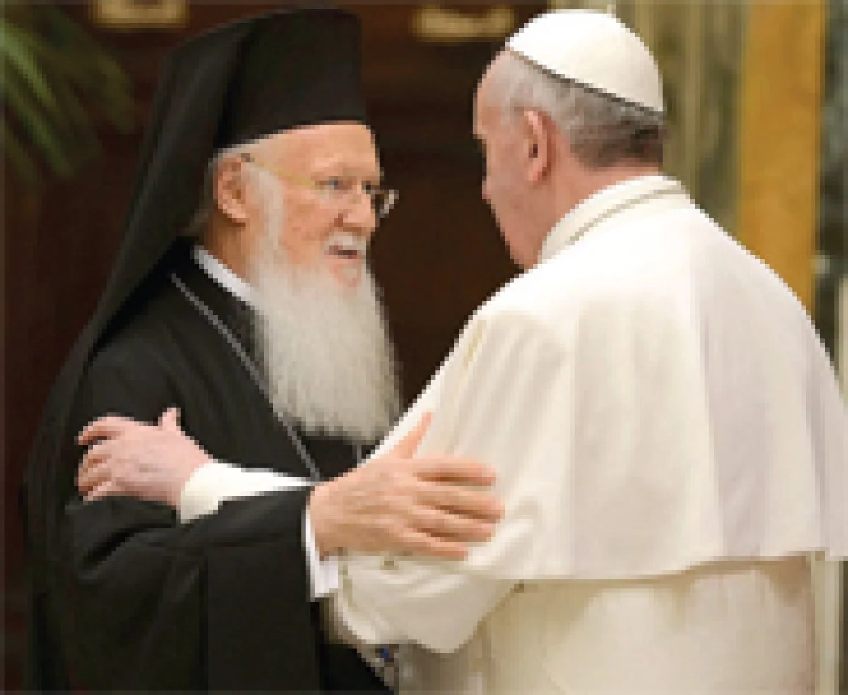 Ecumenical Patriarch Bartholomew of Constantinople and Pope Francis greet each other at the inaugural Mass for Pope Francis