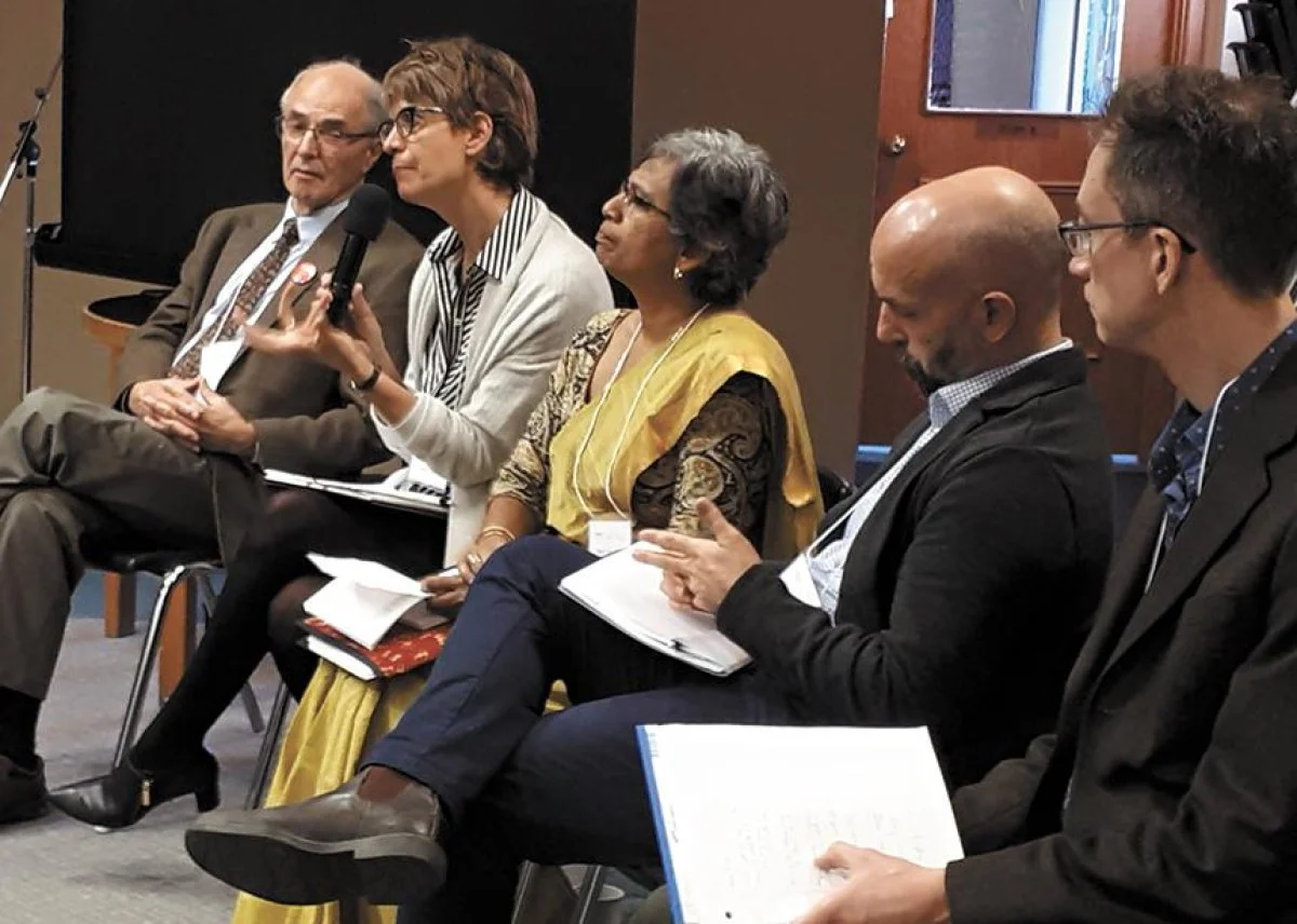 Cristina Vanin, second from left, responds to feedback at the ‘One Baptism? A Symposium on Baptism and the Christian Life’ event during a panel discussion. Also pictured, from left to right: John Rempel, Mary (Joy) Philip, Anthony Siegrist and facilitator Jeremy Bergen