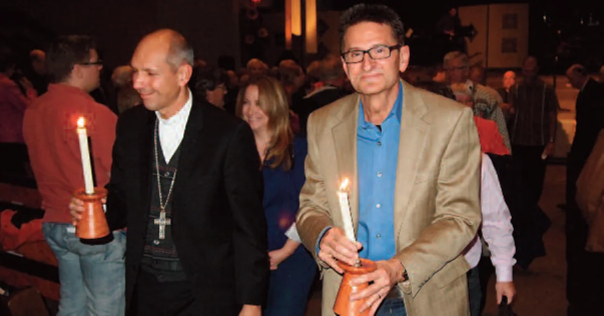 Bishop Donald Bolen and Pastor Eldon Boldt lead the recessional after the Evangelical-Catholic service