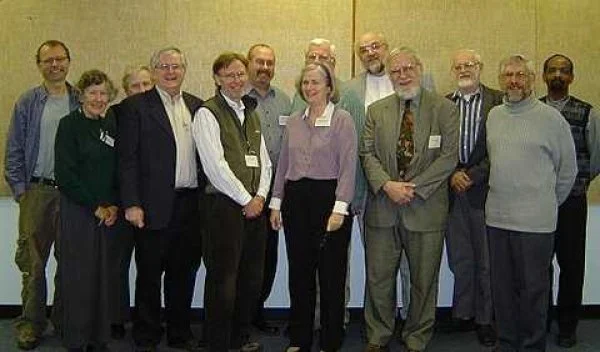 Dr Stuart Brown and Anna Tremblay with the 'burlap' church leaders