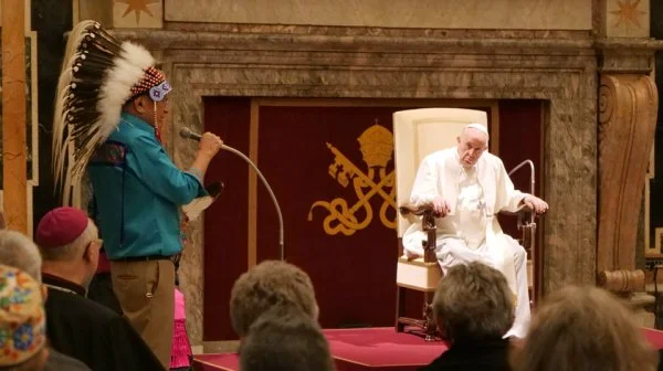 Elder Fred Kelly, a spiritual adviser to the First Nations' delegation, prays for Pope Francis during a meeting with Indigenous elders, knowledge keepers, abuse survivors and youth from Canada and representatives of Canada's Catholic bishops at the Vatican