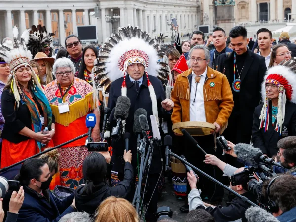 Phil Fontaine, former Grand Chief of the Assembly of First Nations, speaks to reporters in St. Peter's Square following a visit with Pope Francis