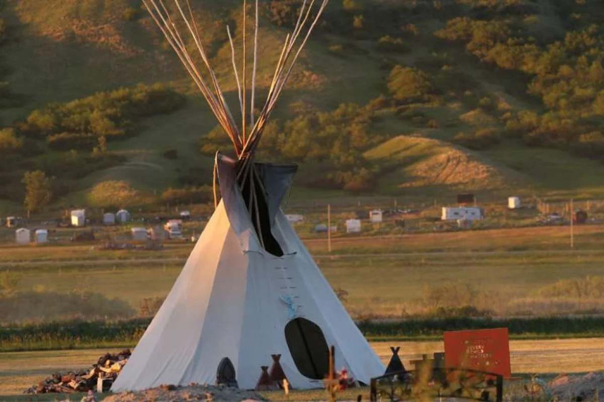 A teepee stands in the graveyard in the Cowessess First Nation near Grayson, Saskatchewan