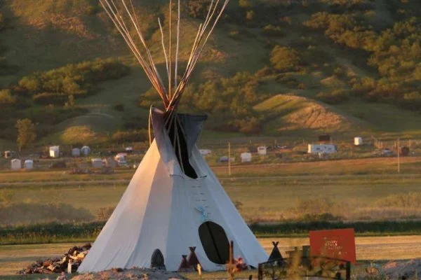 A teepee stands in the graveyard in the Cowessess First Nation near Grayson, Saskatchewan