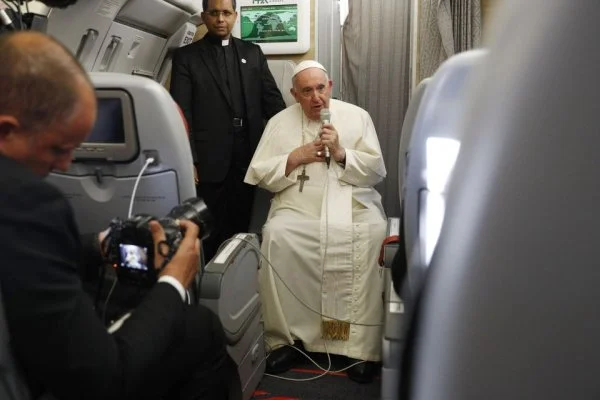 Pope Francis answers questions from journalists aboard his flight from Iqaluit to Rome