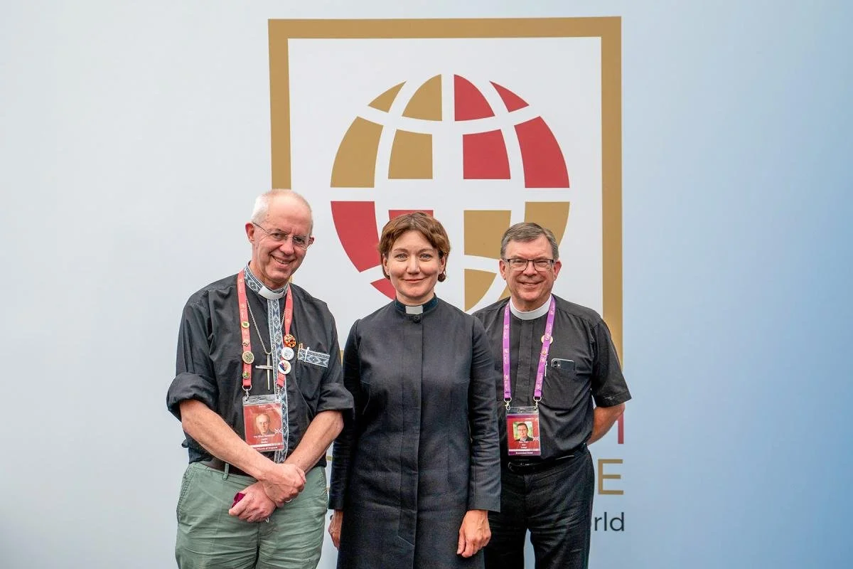 During the 15th Lambeth Conference, Archbishop of Canterbury, Justin Welby, poses with LWF General Secretary, Rev. Anne Burghardt, and Associate General Secretary for Ecumenical Relations, Rev. Dirk Lange