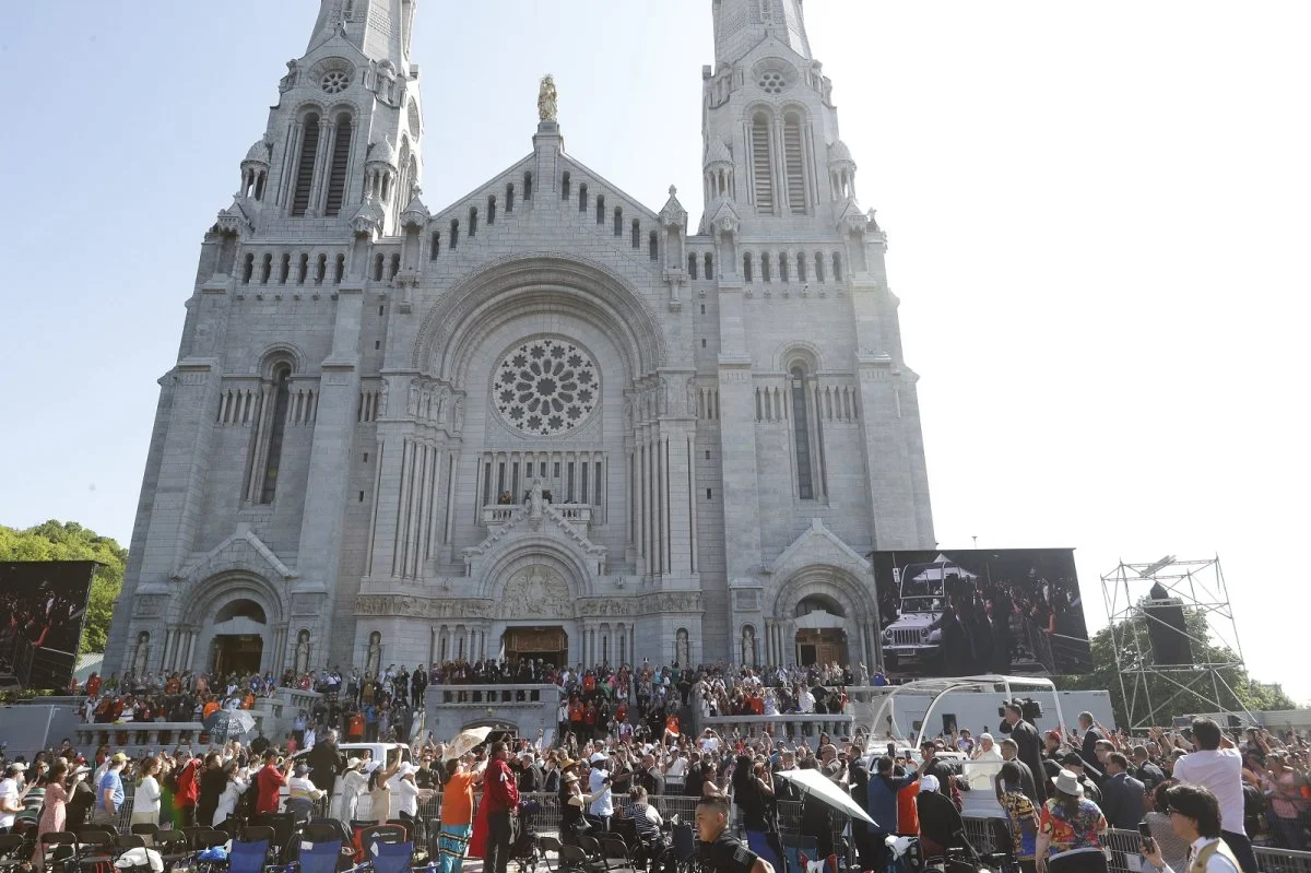 Crowds greet the Pope outside Canada's Shrine of Sainte-Anne-de-Beaupré