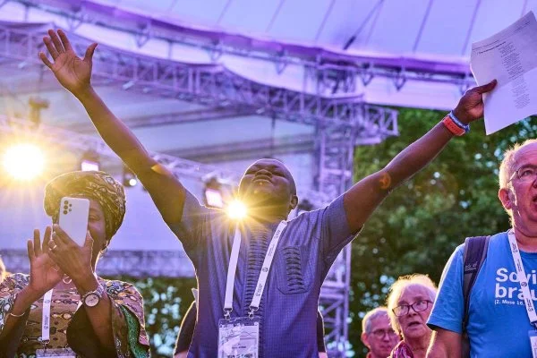George Andoh participates in an afternoon prayer service at the 11th Assembly of the World Council of Churches, held in Karlsruhe, Germany. This prayer service was sponsored by members of the Pentecostal community. The Assembly's theme is 'Christ's Love Moves the World to Reconciliation and Unity'