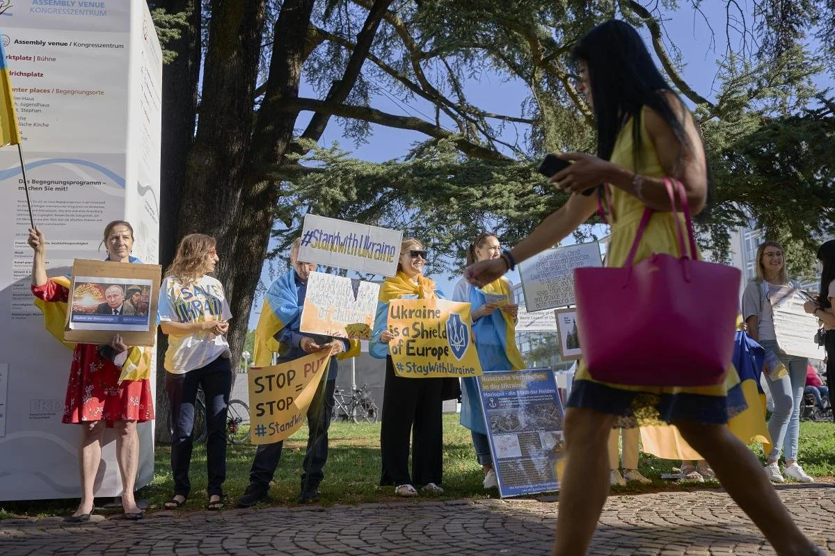 Supporters of Ukraine demonstrate outside the 11th Assembly of the World Council of Churches, held in Karlsruhe, Germany. The Assembly's theme is 'Christ's Love Moves the World to Reconciliation and Unity'