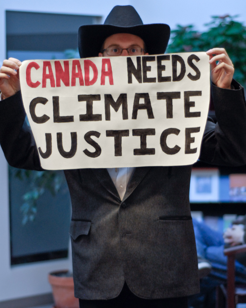 Photo from a sit-in at Environment Minister Jim Prentice's constituency office, Calgary Alberta, November 23
