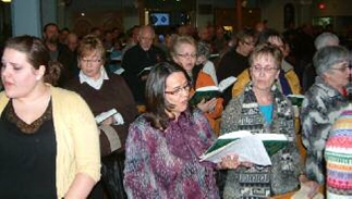 Congregation singing at the Evangelical-Catholic worship service in Saskatoon