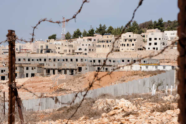 The report prepared by the United Church's Working Group on Israel-Palestine Policy calls settlements 'a serious obstacle' to peace