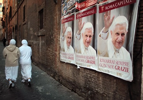 Posters on a Roman street for a recent book by the recently-retired Pope Benedict XVI