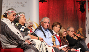 Members of the the Truth and Reconciliation Commission (TRC), political leaders, church leaders and Aboriginal organizations celebrate the opening of the sixth national TRC event in Vancouver, September 2013.