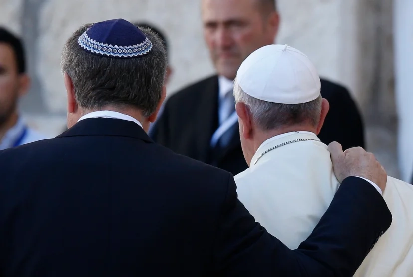 Rabbi Abraham Skorka of Buenos Aires and Pope Francis embrace after visiting the Western Wall in Jerusalem