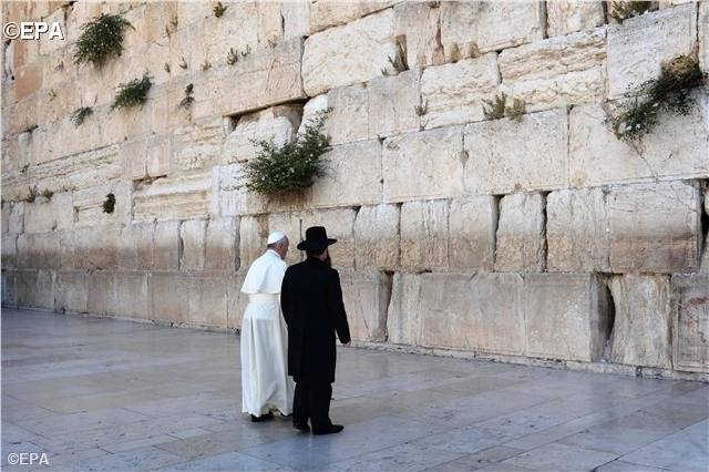 Pope Francis prays at the Western Wall in Jerusalem during his visit to the Holy Land