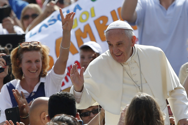 Pope Francis greets the crowd during a general audience last month. Photo: CNS/Paul Haring