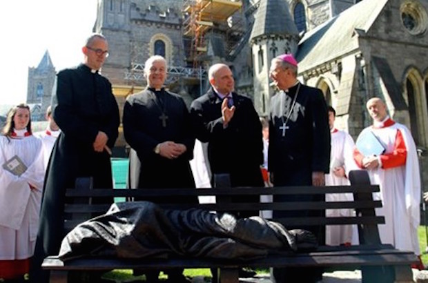 Dean Dermont Dunne, Church of England Archbishop Michael Jackson, sculptor Tim Schmalz and Roman Catholic Archbishop Diarmuid Martin at the blessing and unveiling of the Jesus the Homeless sculpture in Dublin