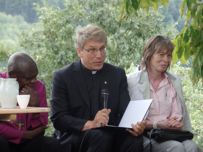 WCC general secretary Olav Fykse Tveit (in the middle) at the 'New Solidarity' event of Taizé Community in France