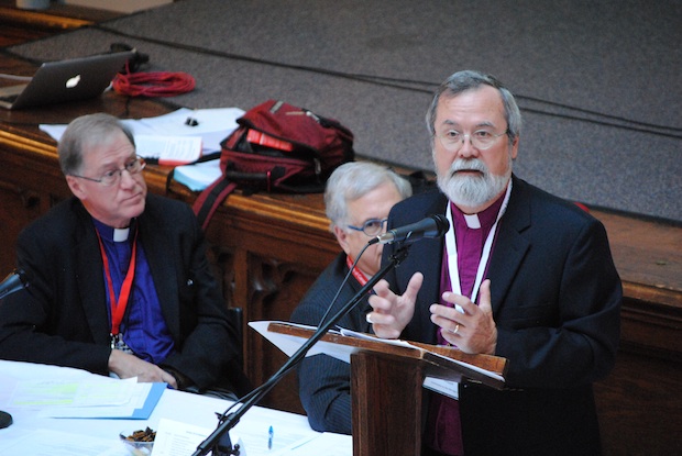 Archbishop John Privett, a member of the Anglican Church of Canada's Commission on the Marriage Canon, presents a section of the report to Council of General Synod
