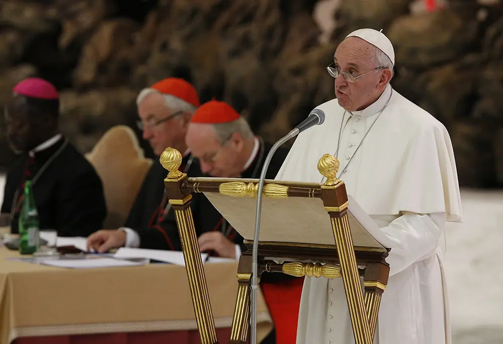 Pope Francis speaks at an event marking the 50th anniversary of the Synod of Bishops in Paul VI hall at the Vatican. The pope in his speech outlined his vision for how the entire church must be 