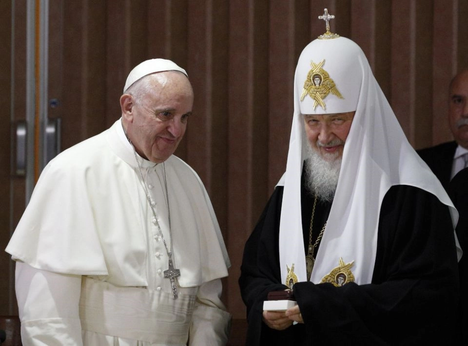 Pope Francis presents gifts to Russian Orthodox Patriarch Kirill of Moscow after the leaders signed a joint declaration during a meeting at Jose Marti International Airport in Havana
