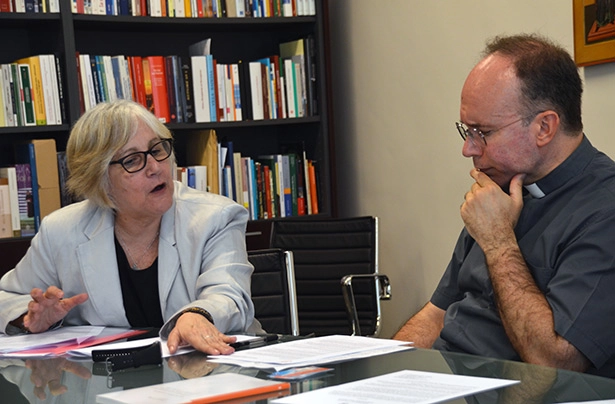 Rev. Dora Arce Valentin, WCRC executive secretary for justice meeting with an official of the Pontifical Council for Justice and Peace