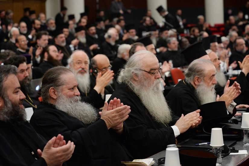 Orthodox leaders applaud June 24 during the Great and Holy Council of the Orthodox Church on the Greek island of Crete. Although the Moscow Patriarchate boycotted the event it called the council 'an important event'