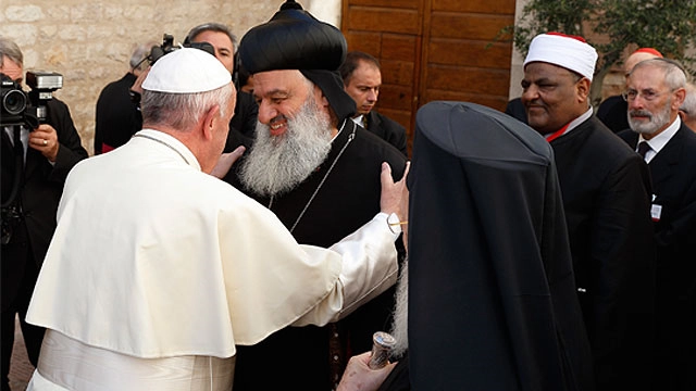 Pope Francis greeting religious leaders at Assisi Day of Peace